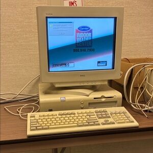Dell Beige Desktop Computer with Monitor and Keyboard